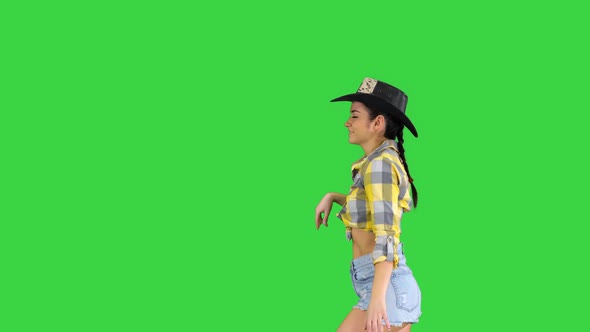Cowboy Girl Dances Walking on a Green Screen, Chroma Key