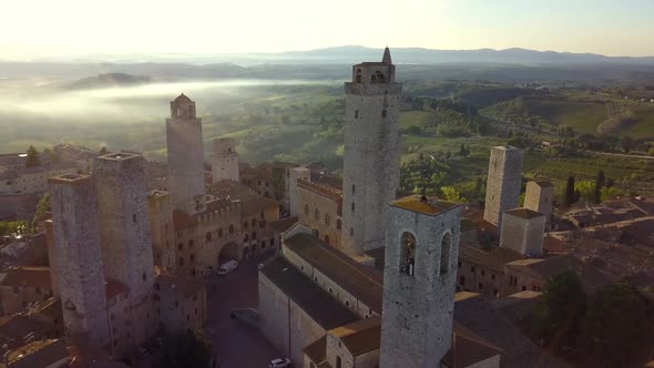 San Gimignano Tuscany Italy with Torre Grossa landmark in the center, Aerial circular shot