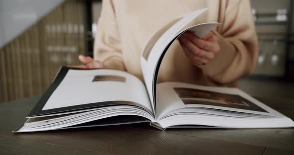 Slow Motion Young Woman Hands Flipping Through Bullet Journal White Paper Pages