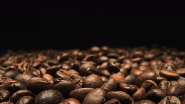 Beautiful View Of Falling Coffee Beans. Close-up.