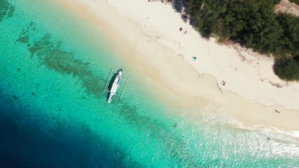 Aerial drone shot tourism of marine seashore beach journey by shallow sea and white sandy background