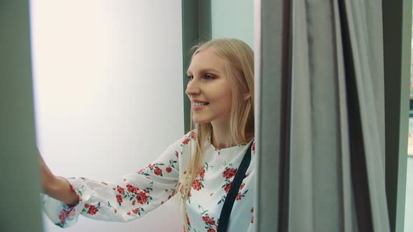 Funny Cheerful Girl in Photo Booth Posing for Camera Having Fun Doing Series of Photo