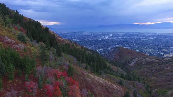 Aerial view on hillside above city during Fall.