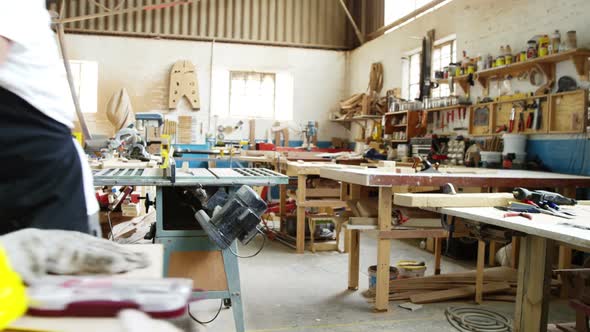 Two carpenters working on their plan