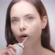 Woman Cleaning Teeth with Water Flosser  - VideoHive Item for Sale
