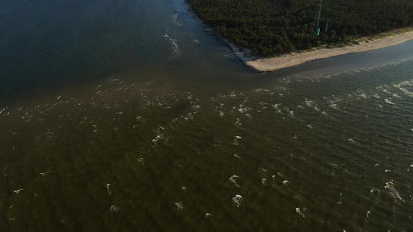 Amazing Aerial View: Top Point of Cape Kolka with Beautiful Waves of Baltic Sea