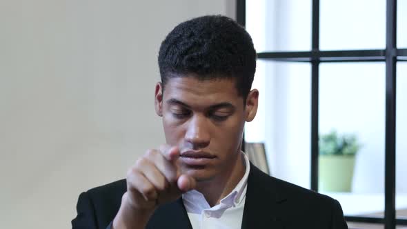 Black Businessman Pointing at Camera, Portrait