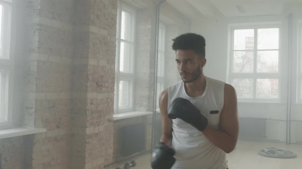 Afro-American Sports Man Doing Punches Exercise