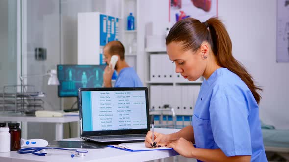 Doctor Assistant Checking List Diagnosed of Patients