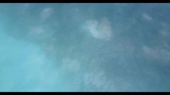 Aerial texture of marine coastline beach vacation by aqua blue ocean with white sandy background of 