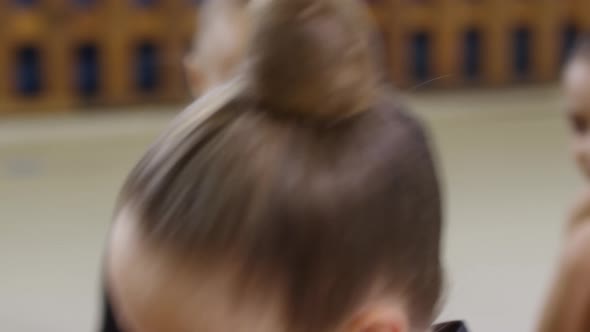 Portrait of Cute Girl in Gymnastics Class