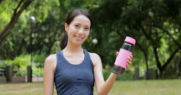 Sport woman drink of water