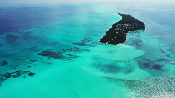 Aerial drone view panorama of marine coastline beach lifestyle by blue green sea and clean sandy bac