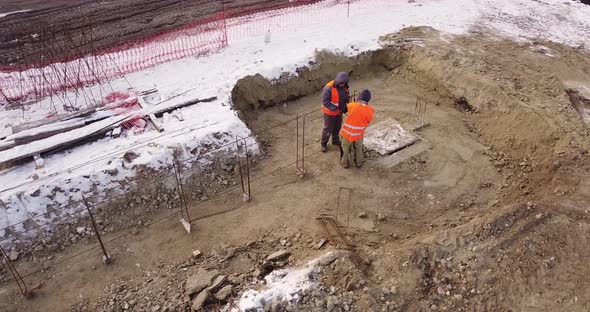 Building Workers Are Constructing a Metal Framework