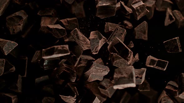 Super Slow Motion Shot of Raw Chocolate Chunks After Being Exploded Towards The Camera at 1000Fps