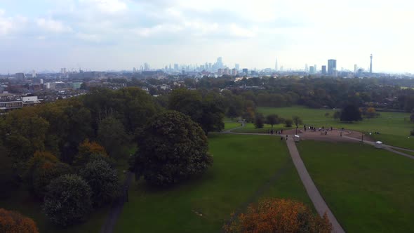 Beautiful Aerial View of London with Many Green Parks and City Skyscrapers