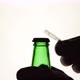The Silhouette of Male hands opening brown beer bottle with opener - VideoHive Item for Sale