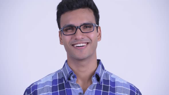 Face of Happy Young Indian Hipster Man Smiling