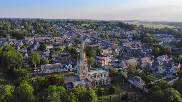 Aerial Drone View of Cotswolds Village and Burford Church in England, a Popular English Picturesque