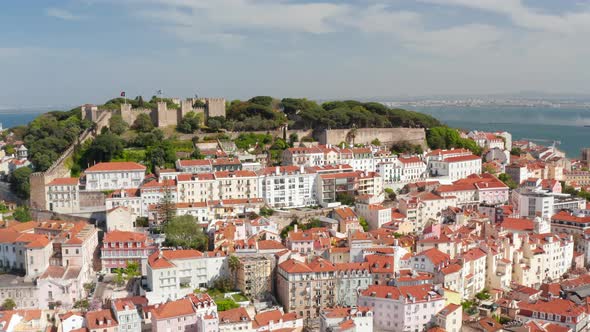 Aerial View of Castelo De S Jorge Lisbon Castle on the Hill Above Colorful Traditional Houses in