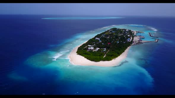Aerial nature of relaxing sea view beach lifestyle by blue water with white sand background of a day