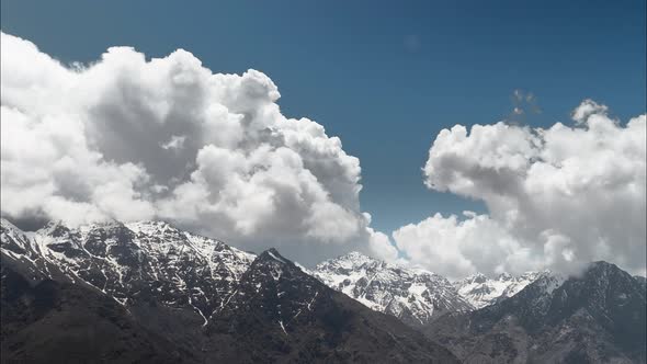 Storm clouds forming over Jebel Toubkal peak in High Atlas, Morocco