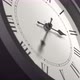 Latin Clock Face In Time Lapse On Dark Grey Wall  - VideoHive Item for Sale
