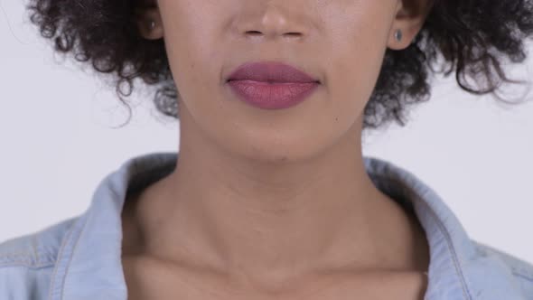 Closeup of Happy Young Beautiful African Woman Smiling