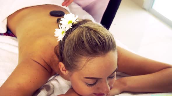 Hot Stone Massage Treatment By Therapist in Spa