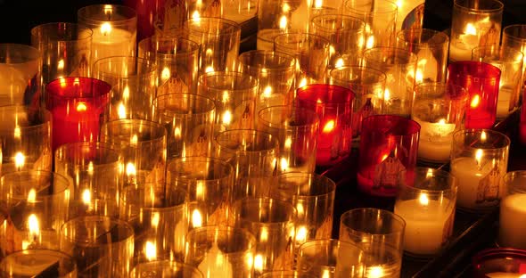 A Votive candle rack - prayer candles in a christian church