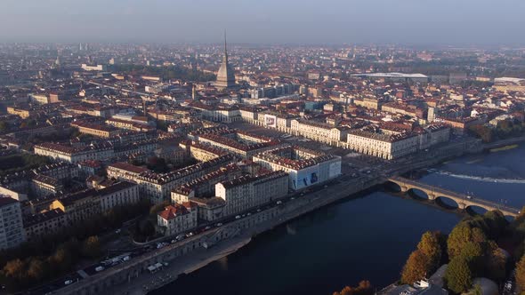 Aerial View Of Turin City With River Po, Ponte Vittorio Emanuele I, And Mole Antonelliana In Piedmon