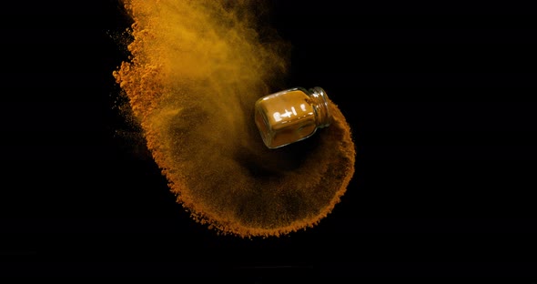 Turmeric, curcuma longa, Powder falling against Black Background, Indian Spice, Slow Motion 4K