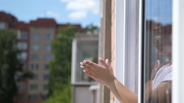 Girl Clapping on the Balcony To Support Those Who Fight Coronavirus