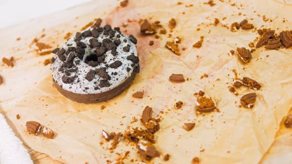 Chocolate Donuts Decorated with Pieces of Oreo Biscuits