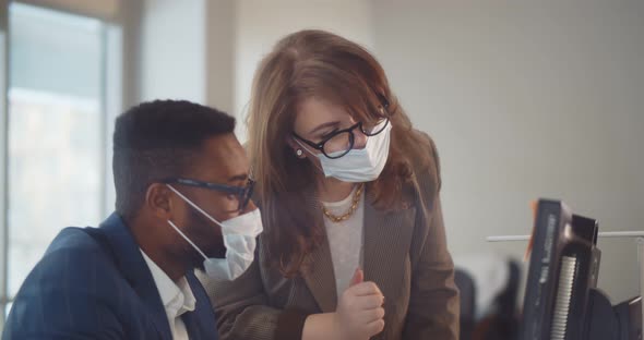 Business Colleagues Working in Office with Face Mask During 2019Ncov Pandemic