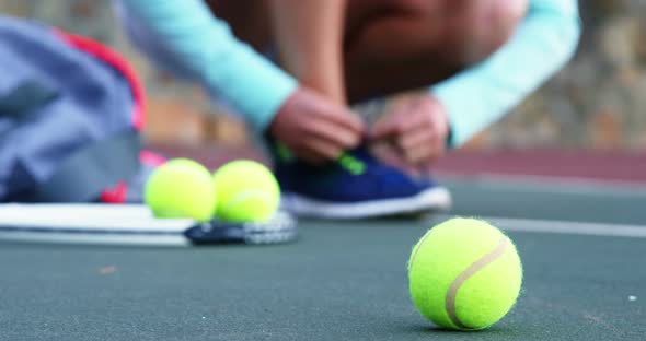 Close-up of tennis ball in court