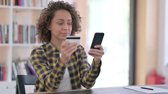 Online Shopping Payment on Smartphone By Mixed Race Woman 