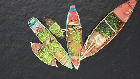 Aerial view of people working on commercial boats, Buriganga, Dhaka, Bangladesh.