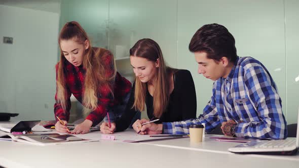 Group of Young Hipster People Working Together in Modern Office