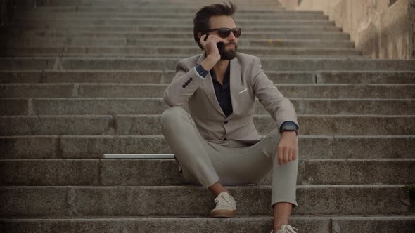 Businessman With Phone On Step. Freelancer Internet Online Meeting Webinar. Man Freelance.