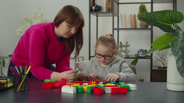 Caring Mom Developing Disabled Kid Skills with Learning Games