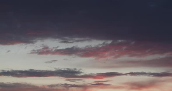 Pink Sunset on a Background of Clouds Timelapse