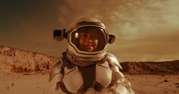 Female Astronaut Looking at Camera on Mars