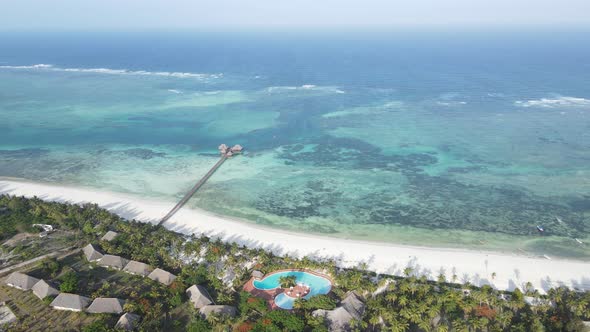 Aerial View of a House on Stilts in the Ocean on the Coast of Zanzibar Tanzania Slow Motion