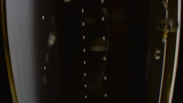 Close Up of a Glass of Champagne. Black Background