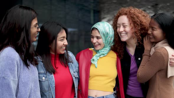 Multiracial female friends having fun outdoor - People from diverse cultures and race