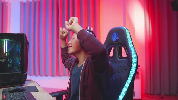 Child Gamer Making Wins Playing Video Game, Dancing While Winning Video Game