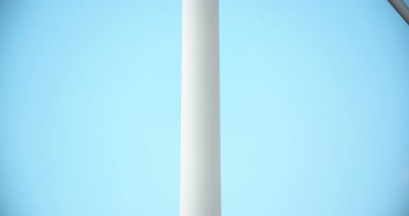 Windmill Spinning Against Sky