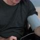 Man using blood pressure monitor - VideoHive Item for Sale