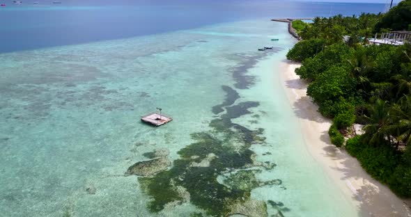 Tropical birds eye clean view of a paradise sunny white sand beach and turquoise sea background in 4